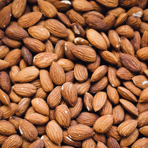 Sweet almonds spread out on a table