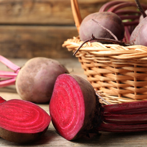 cut up beet next to basket of beets