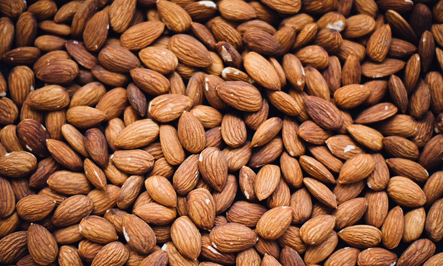 Sweet almonds spread out on a table