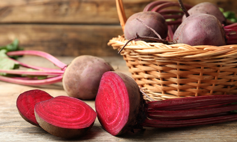 cut up beet next to basket of beets